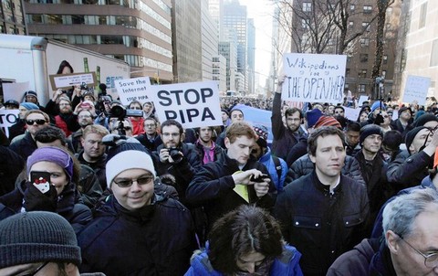 Demonstrators in New York protest proposed anti-piracy legislation that opponents say could lead to censorship online and force some websites out of business. (Richard Drew, Associated Press / January 18, 2012)