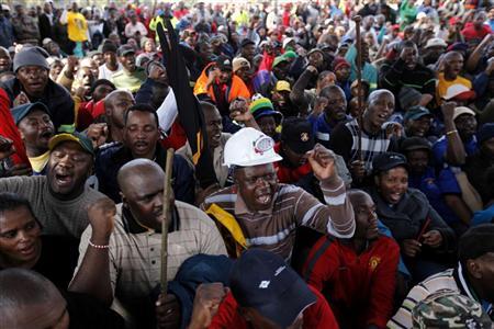 Striking workers take part in a march at Emalahleni,