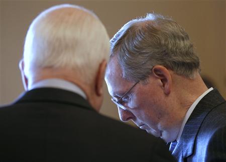 Senator John McCain (R-AZ) (L) and Senate Minority Leader Mitch McConnell talk as they await the arrival of Israeli Prime Minister Benjamin Netanyahu for a meeting with Senate leaders at the U.S. Capitol