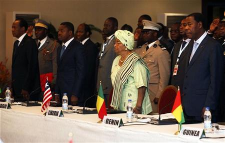 Burkina Faso's President Blaise Compaore (L-R), Togo's President Faure Gnassingbe, Liberia's President Ellen Johnson-Sirleaf and Benin's President Thomas Boni Yayi attend an extraordinary meeting of the Economic Community of West African States (ECOWAS) in Abidjan March 27, 2012. REUTERS/Thierry Gouegnon