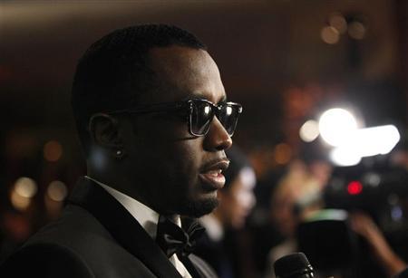 Sean "P. Diddy" Combs is being interviewed at the 13th annual Warner Bros and InStyle after party after the 69th annual Golden Globe Awards in Beverly Hills, California January 15, 2012. REUTERS/Mario Anzuoni