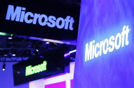 A variety of logos hover above the Microsoft booth on the opening day of the International Consumer Electronics Show (CES) in Las Vegas January 10, 2012. REUTERS/Rick Wilking