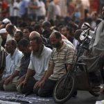 Supporters of Egyptian President-elect Mohamed Mursi pray before a demonstration against the military council and the decision to dissolve parliament, at Tahrir Square in Cairo June 28, 2012. REUTERS/Amr Abdallah Dalsh