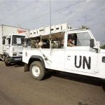 Jordanian soldiers of a United Nations (UN) peacekeeping force keep guard from a vehicle near a UN warehouse from where election materials will be transported to different voting zones in Vridi, Abidjan December 10, 2011. REUTERS/ Thierry Gouegnon