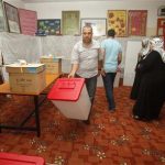 Electoral workers arrange polling materials at a polling station in Tripoli July 5, 2012. REUTERS/Ismail Zitouny