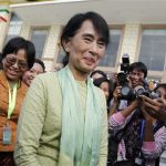 Myanmar pro-democracy leader Aung San Suu Kyi leaves Parliament after attending a meeting at the Lower House of Parliament in Naypyitaw July 9, 2012. REUTERS/Soe Zeya Tun