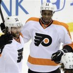 Philadelphia Flyers' Scott Hartnell (L) celebrates with teammates Wayne Simmonds (C) and Claude Giroux after scoring on the New Jersey Devils during the first period in Game 4 of their NHL Eastern Conference semi-final playoff hockey game in Newark, New Jersey, May 6, 2012. REUTERS/Ray Stubblebine