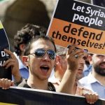 A demonstrator shouts slogans during a protest against the government of Syria's President Bashar al-Assad, in Istanbul August 4, 2012. REUTERS/Osman Orsal