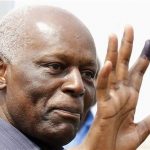 Angola's President Jose Eduardo dos Santos shows off his inked finger to photographers after casting his vote during national elections in the capital Luanda, August 31, 2012. REUTERS/Siphiwe Sibeko