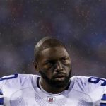 Dallas Cowboys nose tackle Jay Ratliff stands in the rain before playing the New York Giants in their NFL football game in East Rutherford, New Jersey, January 1, 2012. REUTERS/Mike Segar