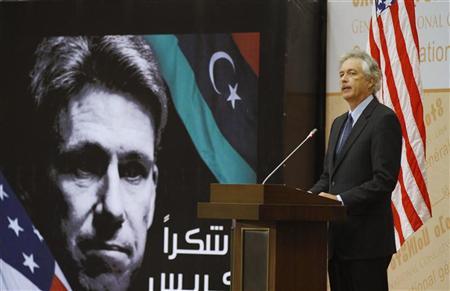 Visiting U.S. Deputy Secretary of State William Burns speaks in front of a picture of slain U.S. ambassador to Libya Christopher Stevens during a ceremony commemorating Stevens in Tripoli September 20, 2012. REUTERS/Anis Mili