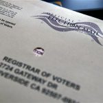 A mail-in ballot for the 2012 Presidential Election is shown in its envelope in Palm Springs, California October 26, 2012. REUTERS/Sam Mircovich