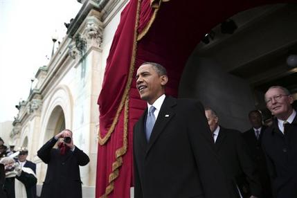 President Barack Obama arrives on the West Front of the Capitol in Washington, Monday, Jan. 21, 2013, for  his ceremonial swearing-in ceremony during the 57th Presidential Inauguration.  (AP Photo/Win McNamee, Pool)