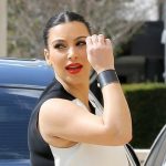 Kim Kardashian looks very pregnant but glam in maternity monochrome