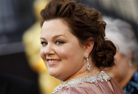 Melissa McCarthy, best supporting actress nominee for her role in "Bridesmaids", arrives at the 84th Academy Awards in Hollywood, California, February 26, 2012. REUTERS/Lucy Nicholson