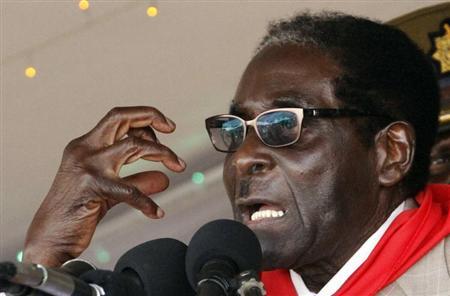 Zimbabwe's President Robert Mugabe gestures as he speaks during an event marking his 89th birthday at Chipadze stadium in Bindura, about 90 km (56 miles) north of the capital Harare March 2, 2013. REUTERS/Philimon Bulwayo