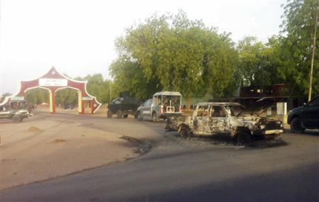 Military vehicles approach the entrance of the Shehu's Palace of Bama, Maiduguri, Borno State, Nigeria. May 7, 2013. REUTERS/Stringer