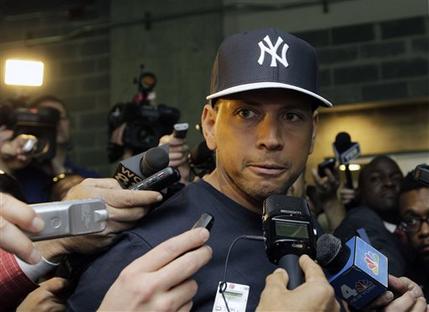 FILE - in this April 1, 2013, file photo, New York Yankees' Alex Rodriguez, who is on the disabled list after hip surgery, talks to reporters outside the Yankees' clubhouse in New York. A person familiar with the case tells The Associated Press Tuesday June 4, 2013 that the founder of a Miami anti-aging clinic has agreed to talk to Major League Baseball about players linked to performance-enhancing drugs. Alex Rodriguez, Ryan Braun, Nelson Cruz and Melky Cabrera are among the players whose names have been tied to the clinic. (AP Photo/Kathy Willens, File)