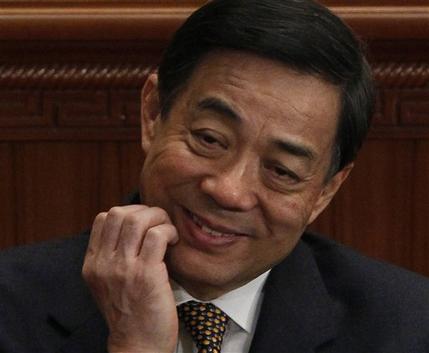 FILE - In this March 5, 2012 file photo, then Chongqing Communist Party Secretary Bo Xilai scratches his chin during the opening session of the National People's Congress in Beijing. Disgraced Chinese politician Bo Xilai was indicted Thursday, July 25, 2013, on charges of corruption, accepting bribes and abuse of power, state media reported, moving China's biggest political scandal in years toward closure. (AP Photo/Ng Han Guan, File)