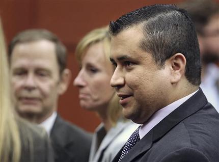 George Zimmerman leaves court with his family after Zimmerman's not guilty verdict was read in Seminole Circuit Court in Sanford, Fla. on Saturday, July 13, 2013. Jurors found Zimmerman not guilty of second-degree murder in the fatal shooting of 17-year-old Trayvon Martin in Sanford, Fla. (AP Photo/Joe Burbank, Pool)