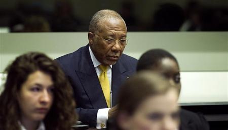 Former Liberian President Taylor listens to the judge at the opening of the sentencing judgement hearing at the court in Leidschendam, near The Hague