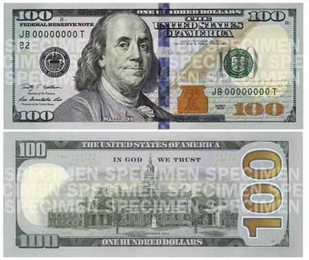 Combination photo shows the front and back of the newly designed $100 bill