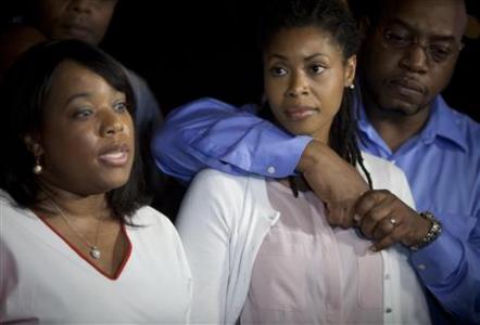 Valarie and Amy, sisters of Miriam Carey, the woman involved in the Capitol Hill shooting, attend a news conference outside their home in the Brooklyn borough of New York