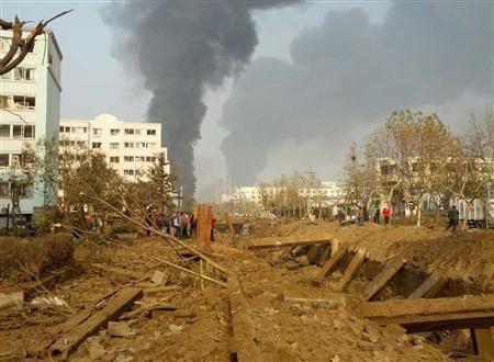 Smoke rises after a pipeline explosion in Huangdao, Qingdao