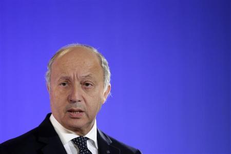 French Foreign Affairs Minister Fabius attends a news conference with US Secretary of State Kerry at the Quai d'Orsay Foreign Ministry after their meeting in Paris