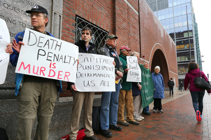 Demonstrators against capital punishment outside federal court