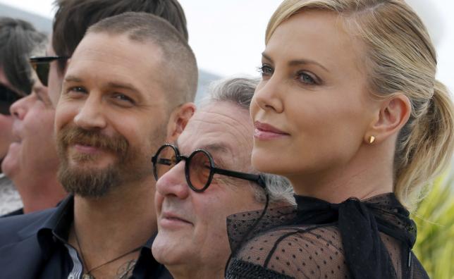 Director George Miller, cast members Tom Hardy and Charlize Theron pose during a photocall for the film "Mad Max: Fury Road" out of competition at the 68th Cannes Film Festival in Cannes