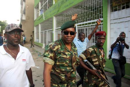 Major General Niyombare arrives at the RPA broadcasting studios to address the nation in Burundi's capital Bujumbura