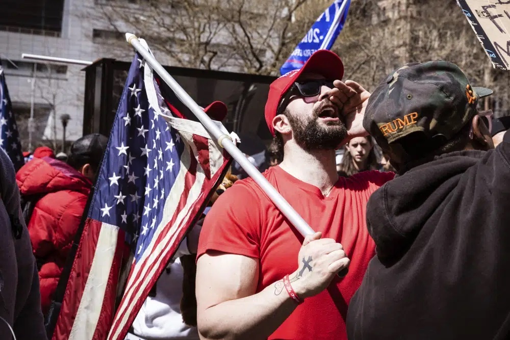 A person yells in support for former President Donald Trump during a protest held in Collect Pond Park across the street from the Manhattan District Attorney's office in New York on Tuesday, April 4, 2023. 