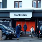 People are seen in front of a showroom that hosts BlackRock in Davos, Switzerland