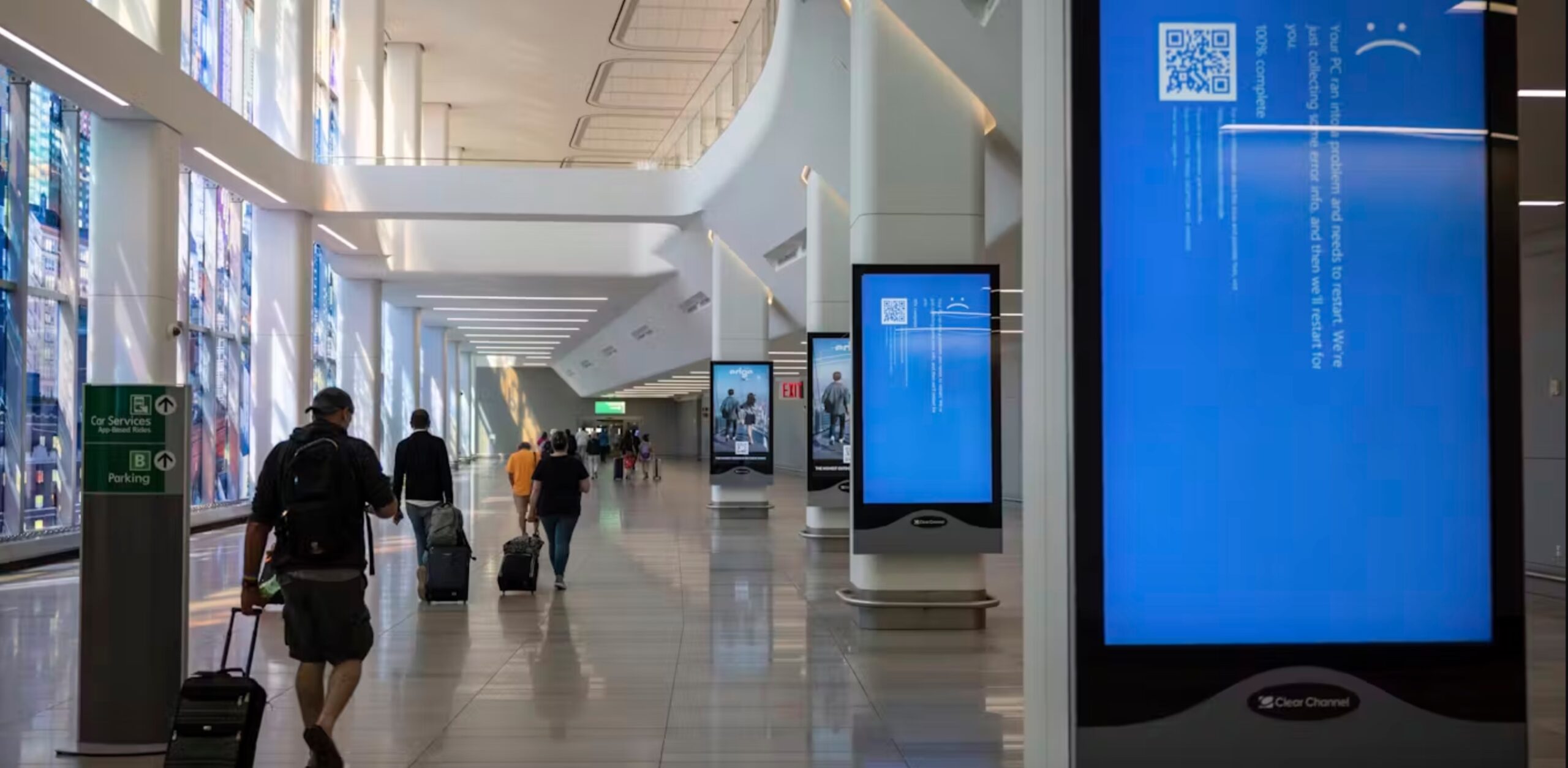 Displays at LaGuardia Airport in New York show the infamous “blue screen of death.”