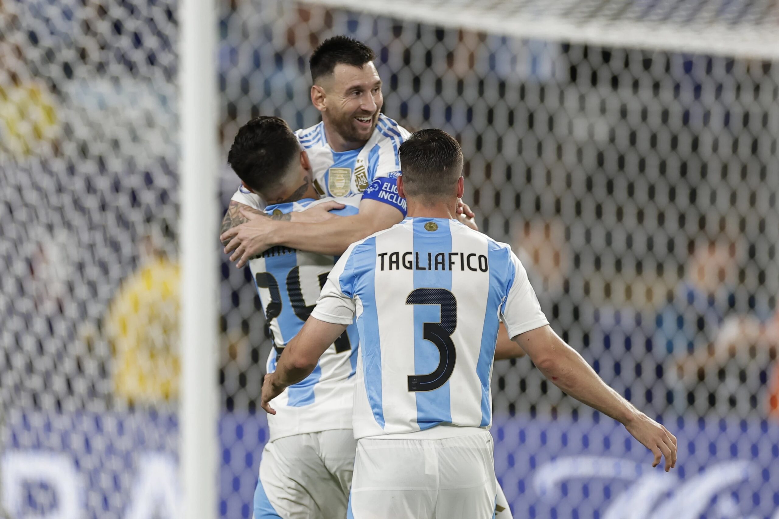 Argentina’s Lionel Messi is congratulated after scoring his side’s second goal against Canada during a Copa America semifinal soccer match in East Rutherford, N.J., Tuesday, July 9, 2024.