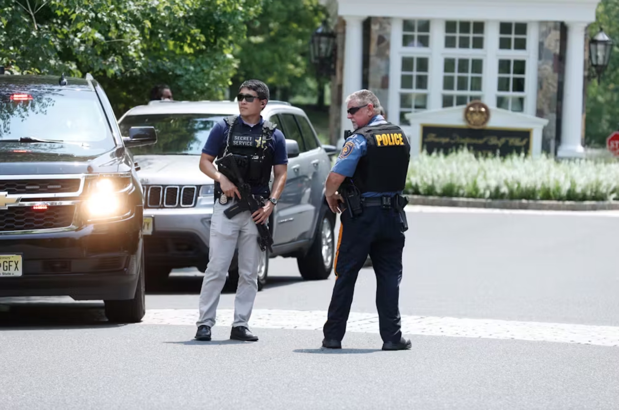 Secret Service and police officers stand outside Donald Trump’s home in Bedminster, N.J., on July 14, 2024. 