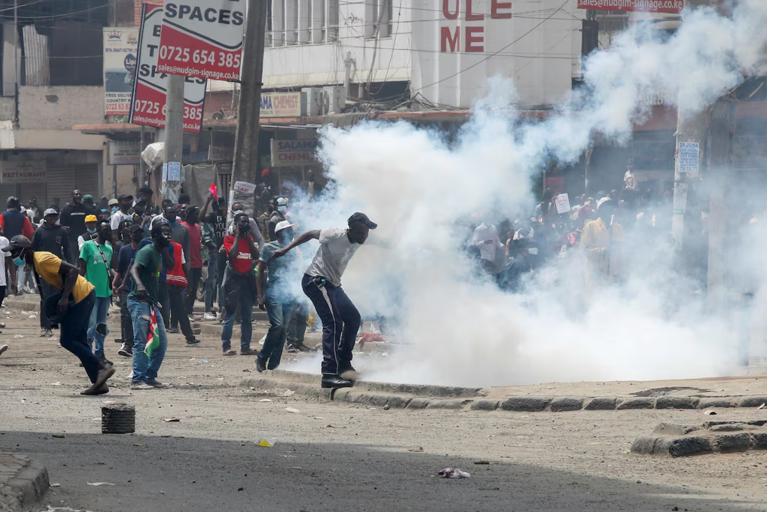 People take part in a demonstration over police killings of people protesting against the imposition of tax hikes by the government, as police use teargas to disperse them, in Nairobi, Kenya, July 2, 2024. 