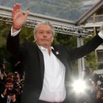 72nd Cannes Film Festival - Red Carpet Arrivals - Cannes, France, May 19, 2019. Alain Delon poses before receiving his honorary Palme d'Or Award.