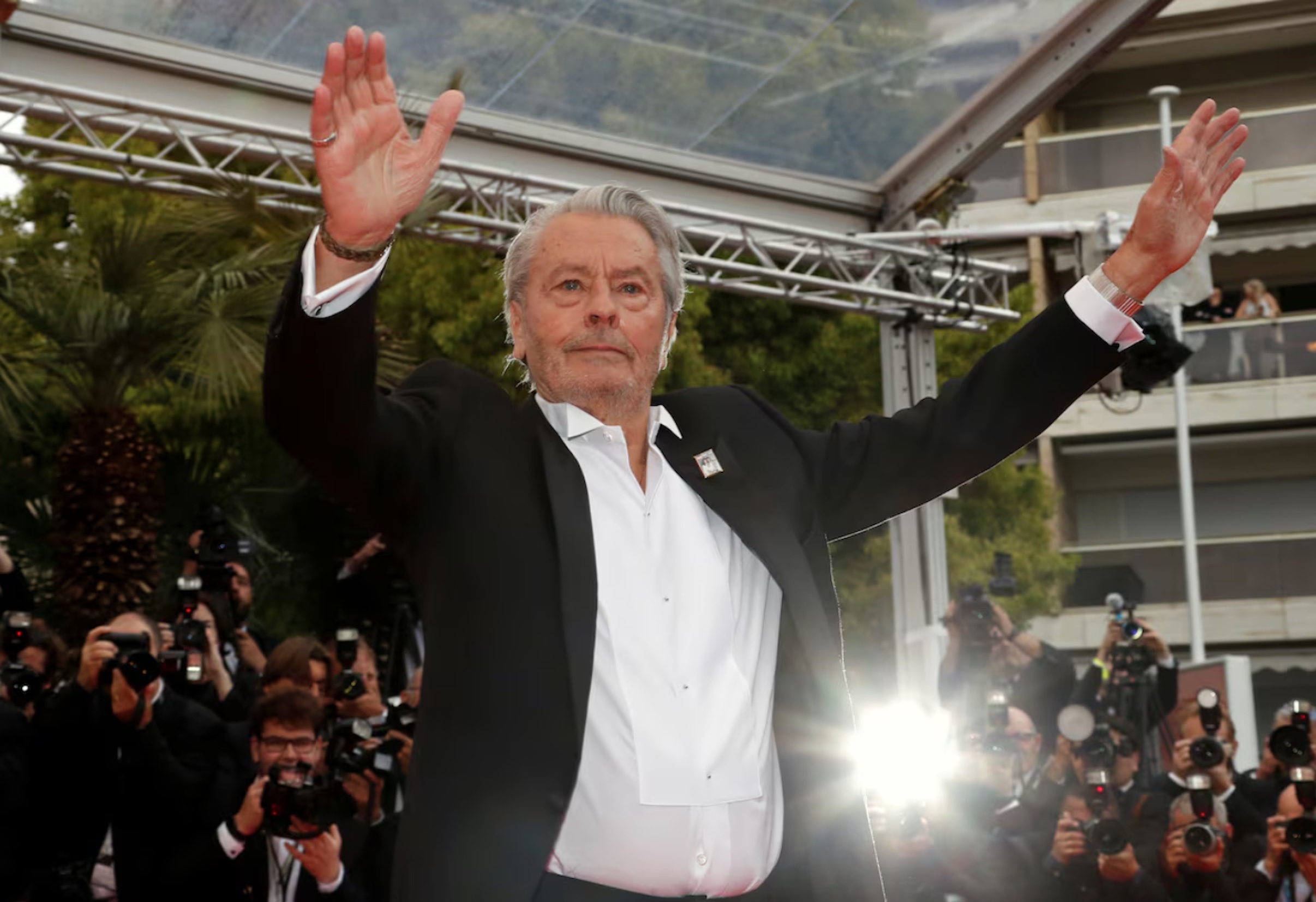 72nd Cannes Film Festival - Red Carpet Arrivals - Cannes, France, May 19, 2019. Alain Delon poses before receiving his honorary Palme d'Or Award. 