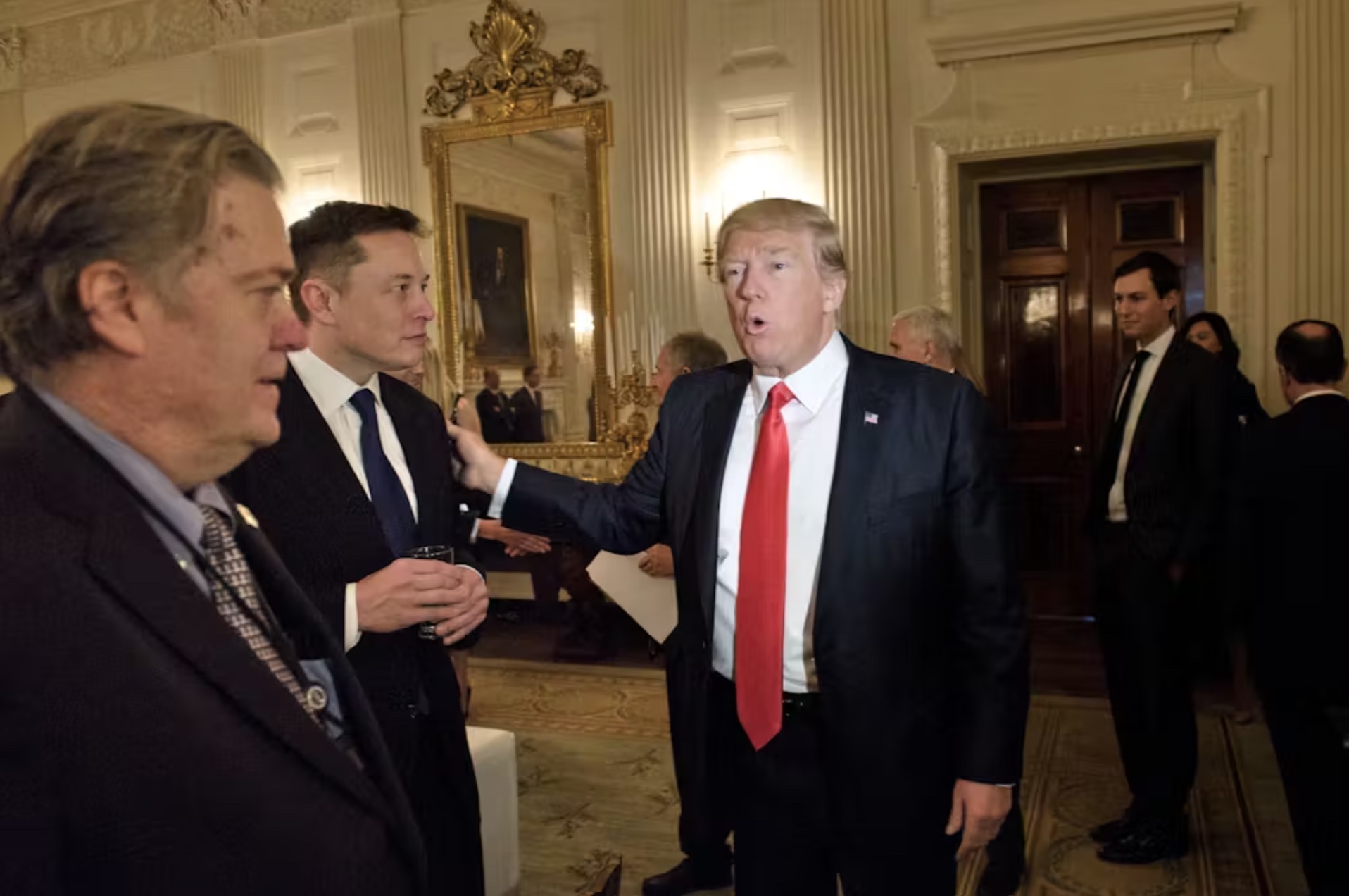 Donald Trump and Elon Musk chat at the White House in 2017