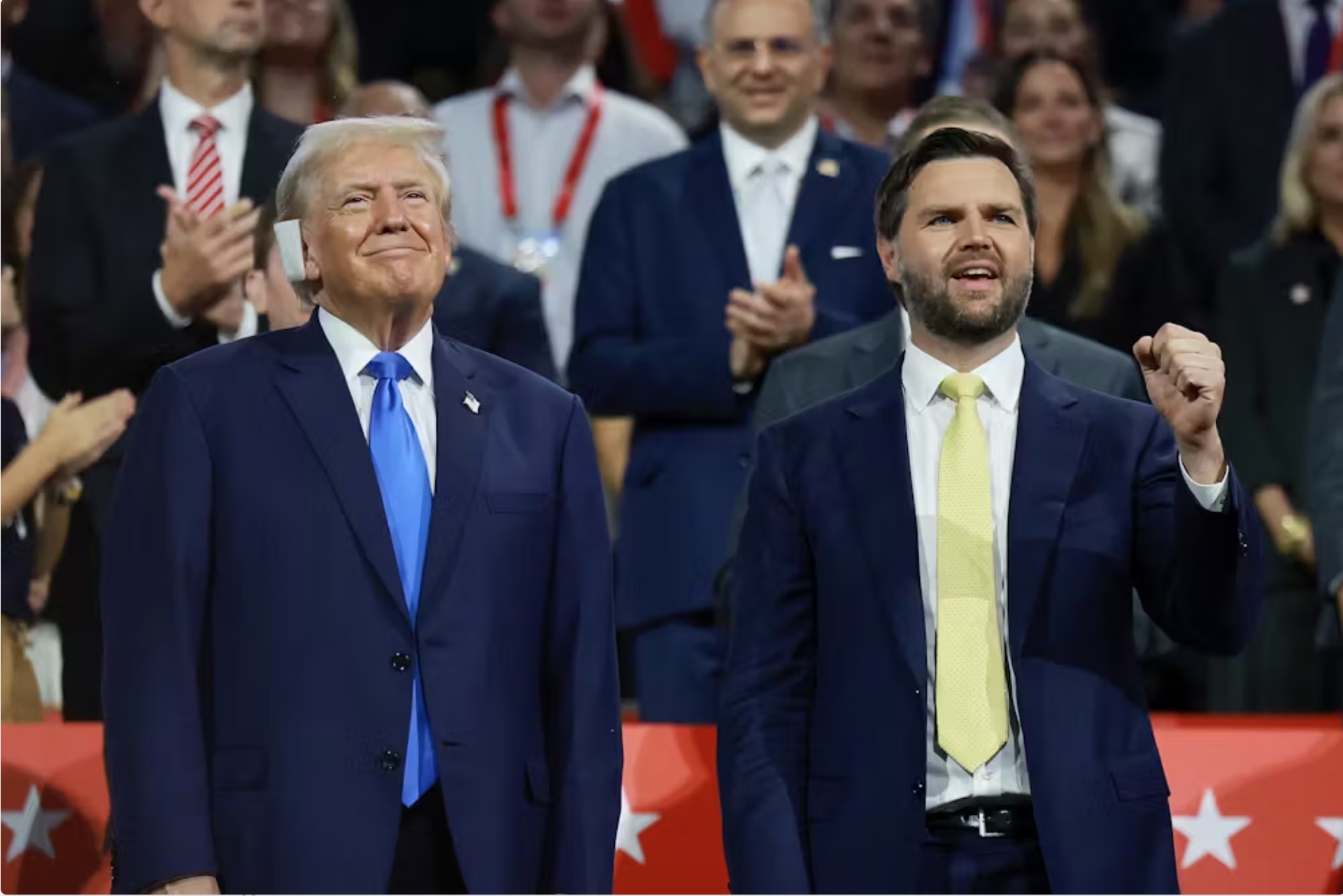 Former President Donald Trump stands with Republican vice presidential candidate JD Vance on the second day of the Republican National Convention in Milwaukee on July 16, 2024. 