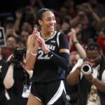 Las Vegas Aces center A’ja Wilson (22) celebrates during the second half of a WNBA basketball game against the Connecticut Sun, Sunday, Sept. 15, 2024, in Las Vegas.