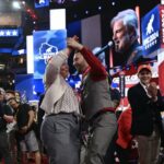 Attendees dance as a band plays during the last day of the 2024 Republican National Convention in Milwaukee.