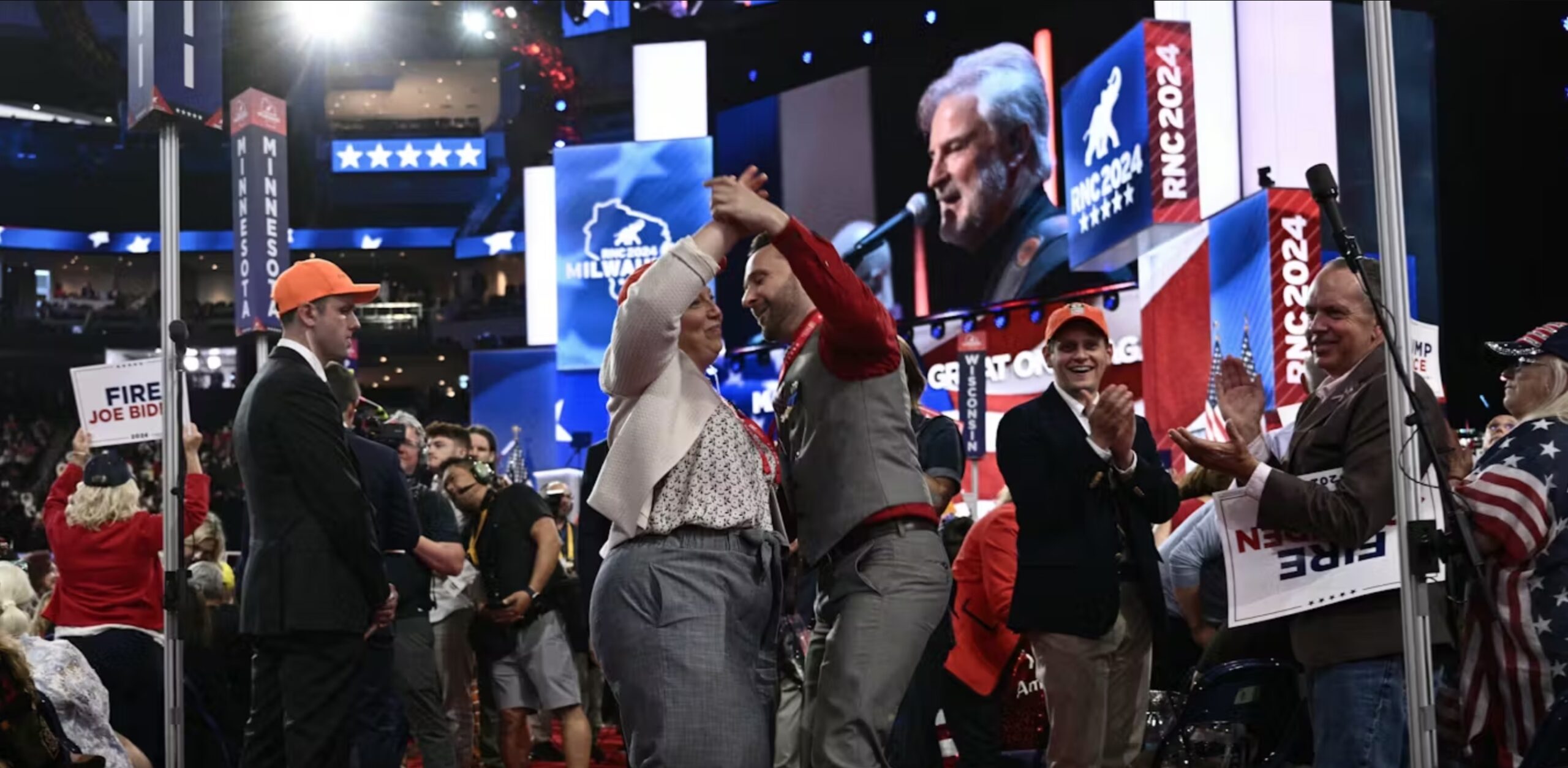 Attendees dance as a band plays during the last day of the 2024 Republican National Convention in Milwaukee. 