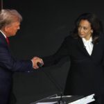 Republican presidential nominee, former U.S. President Donald Trump and Democratic presidential nominee, U.S. Vice President Kamala Harris shake hands as they attend a presidential debate hosted by ABC in Philadelphia, Pennsylvania