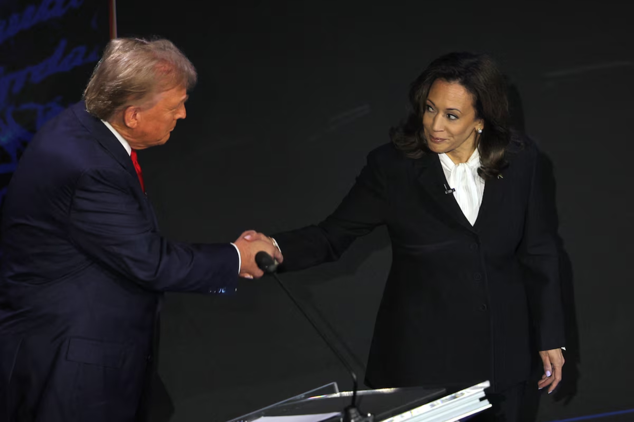 Republican presidential nominee, former U.S. President Donald Trump and Democratic presidential nominee, U.S. Vice President Kamala Harris shake hands as they attend a presidential debate hosted by ABC in Philadelphia, Pennsylvania, U.S.