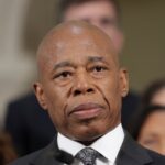 New York City Mayor Eric Adams listens to a reporter during an event in Manhattan in New York City, U.S., September 16, 2024.