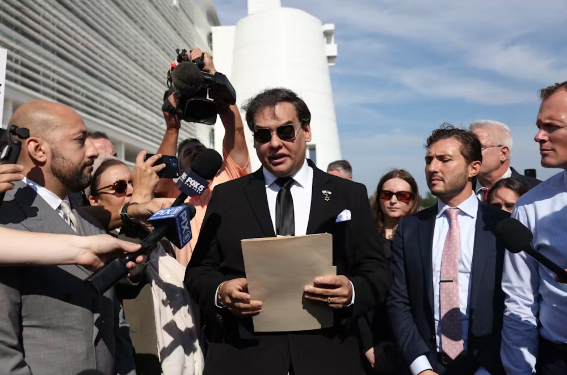 Former U.S. Rep. George Santos outside court after pleading guilty to 23 felony counts on Aug. 19, 2024, in West Islip, N.Y. 