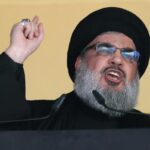 Hezbollah leader Sheik Hassan Nasrallah addresses a crowd during the holy day of Ashoura, in a southern suburb of Beirut, Lebanon.